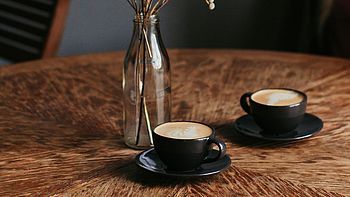 Two cups of coffee on a table. Image under licence Pexels